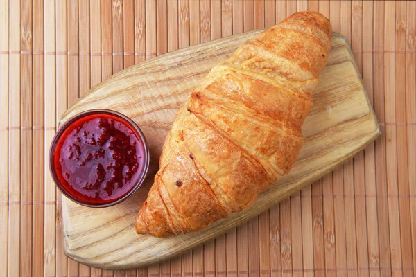 Fresh crusty croissant — Stock Photo, Image