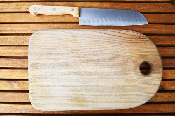 Cutting board and knife — Stock Photo, Image