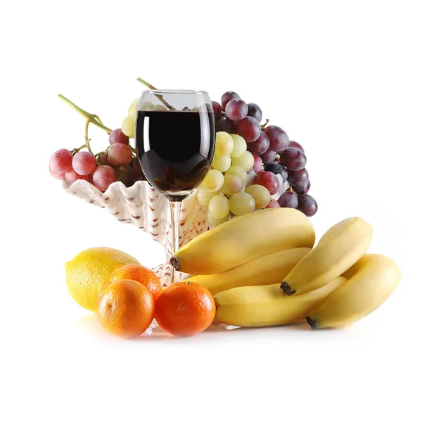 Different fruits and glass of wine — Stock Photo, Image