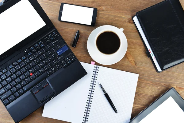 Notebook and cup of coffee — Stock Photo, Image