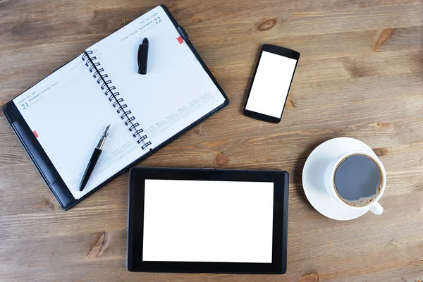 Notebook and cup of coffee — Stock Photo, Image