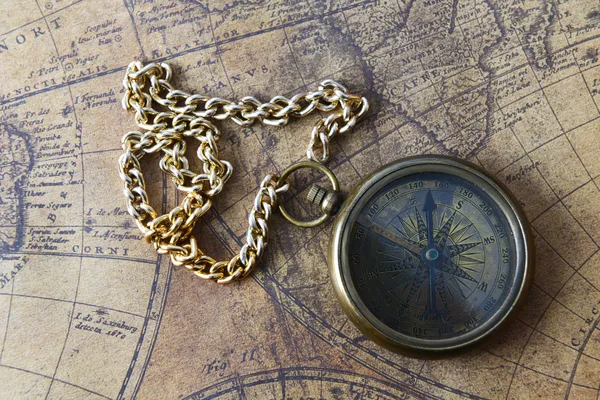 Compass on old map — Stock Photo, Image