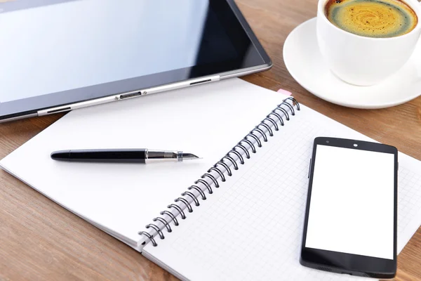 Notebook and cup of coffee — Stock Photo, Image