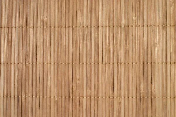 Brown tapete de palha vertical fundo closeup — Fotografia de Stock