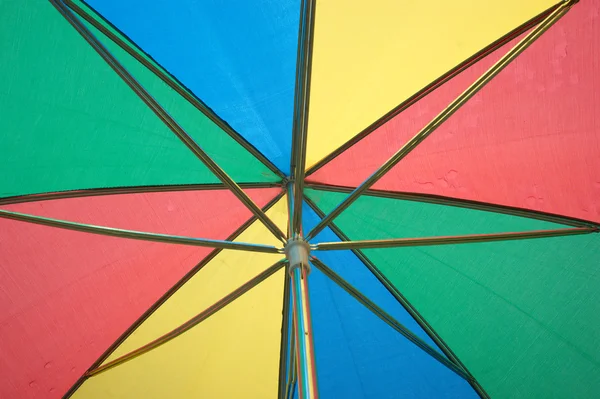 Under color sun umbrella — Stock Photo, Image