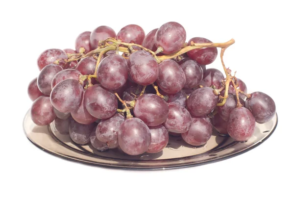 Grape bunch on plate isolated over white — Stock Photo, Image