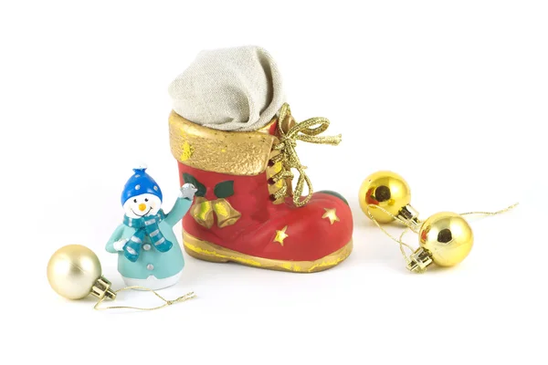 Christmas bootee with gift and snowman — Stock Photo, Image