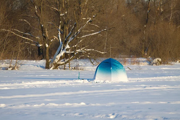 Fisherman color tent on frozen river with snow — Stock Photo, Image
