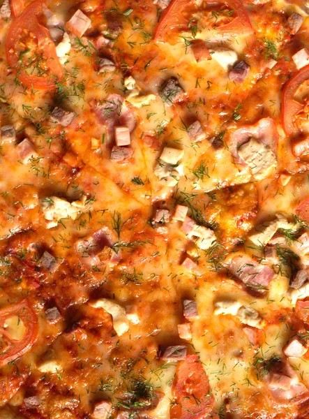 Pizza jako tło zbliżenie — Zdjęcie stockowe