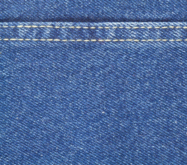 Textuur van blue jeans weefsel met steek — Stockfoto