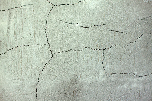 Cracks in concrete wall close