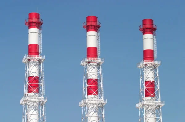 Drie gestreepte industriële kleur pijpen — Stockfoto