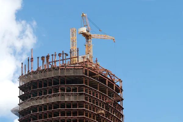 Crane in building construction activity process — Stock Photo, Image