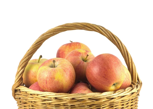 Ripe apples in basket isolated closeup — Stock Photo, Image