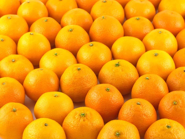 Many tangerines as background closeup — Stock Photo, Image