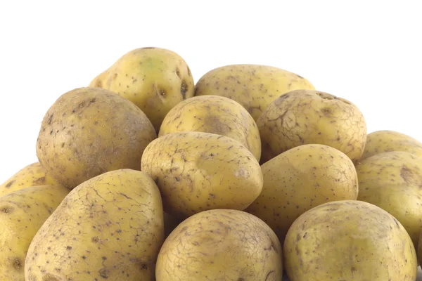 Heap of ripe potatoes isolated on white — Stock Photo, Image