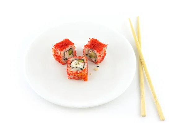 Sushi with fish roe Masago lies on a plate isolated closeup — Stock Photo, Image