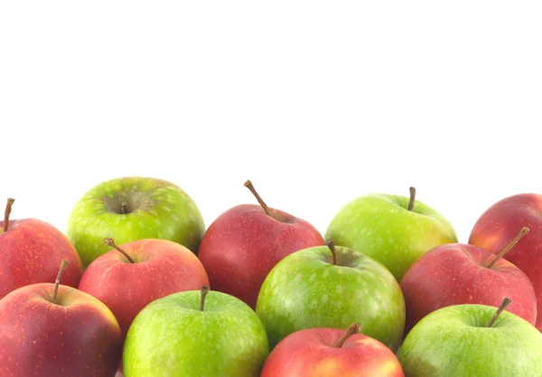 Beaucoup de pommes mûres comme fond isolé sur gros plan blanc — Photo