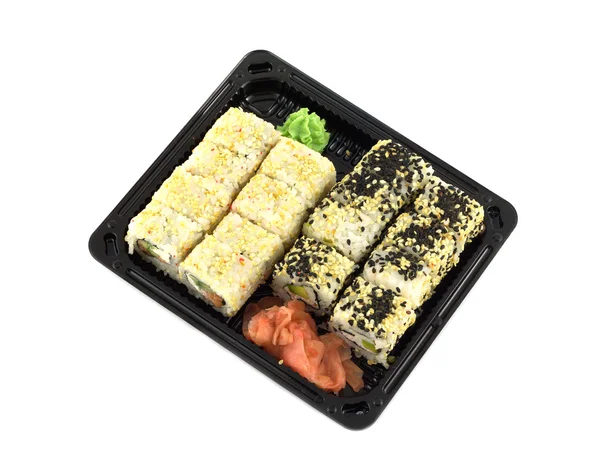 Sushi rolt in kunststoffles geïsoleerd op witte close-up — Stockfoto