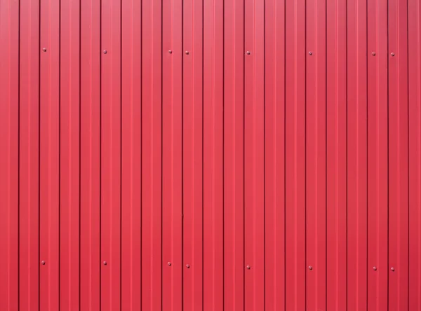 Cerca vertical de metal vermelho como fundo — Fotografia de Stock
