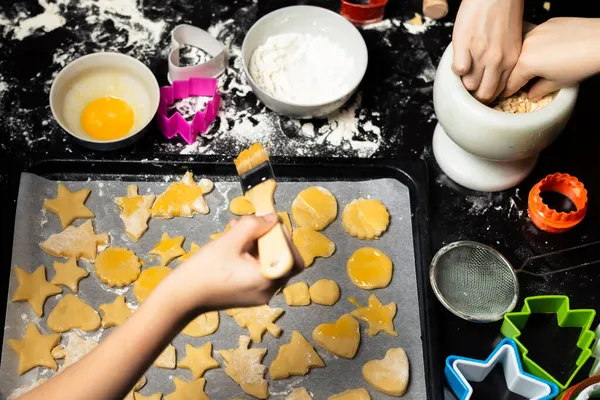 Children Put Cookies Baking Sheet Cooking Different Forms Cookies Holiday — Stock Photo, Image