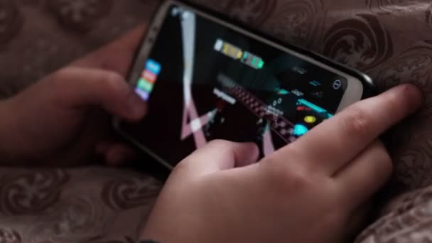 Kyiv Ukraine December 2021 Child Holds Mobile Phone Plays Game — стокове відео