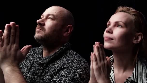 Middle Aged Man Woman Forty Years Old Praying Dark Background — Stockvideo