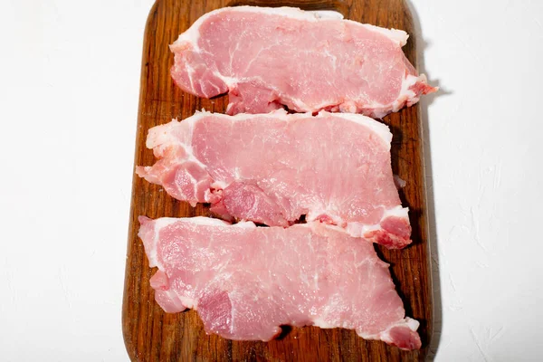 Sliced Pieces Pork Wooden Cutting Board Fresh Meat Preparation Cooking — Stock Photo, Image