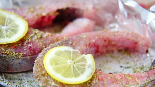 Raw Silver Carp Steaks Lemon Sprinkled Spices Lie Foil Preparation — Vídeo de stock