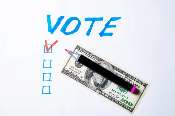 Buying votes of voters concept. Vote, dollars on a white background.