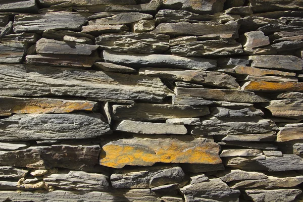 Stone wall. made of slate stone — Stock Photo, Image