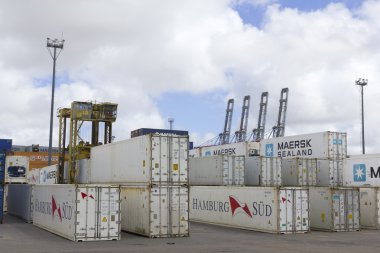 Containers and cranes in the port of Montevideo clipart