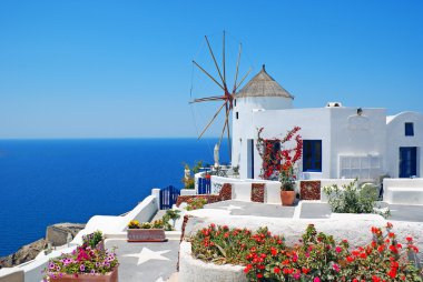 Traditional architecture of Oia village at Santorini island in G clipart