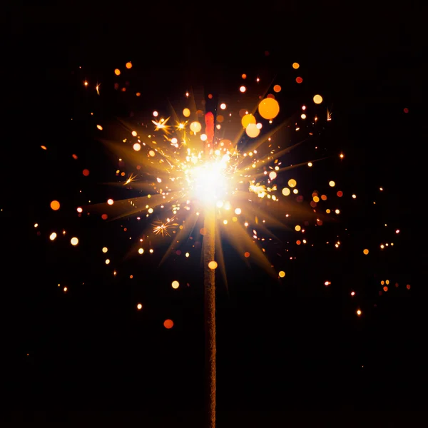 Christmas sparkler with shiny glare — Stock Photo, Image