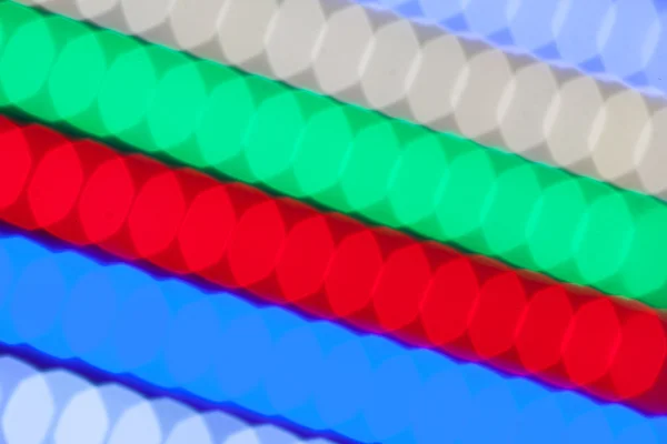 Bokeh multicolor luzes led fundo — Fotografia de Stock