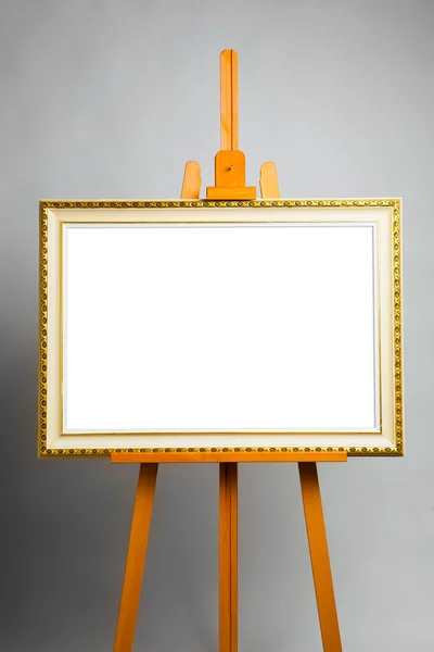 Cavalete com quadro de pintura — Fotografia de Stock