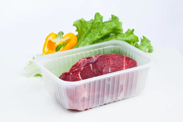 Fresh raw meat and lettuce salad, white background — Stock Photo, Image