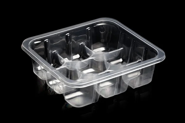 Plastic container isolated on black — Stock Photo, Image