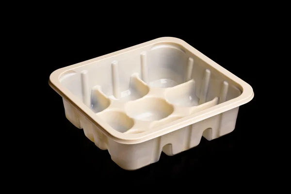 Plastic container isolated on black — Stock Photo, Image