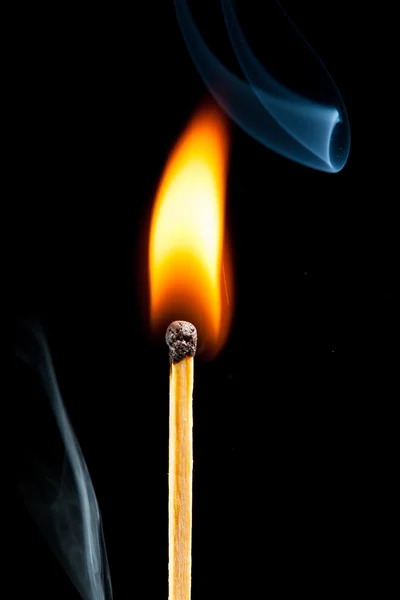 Burning match with smoke, black background — Stock Photo, Image