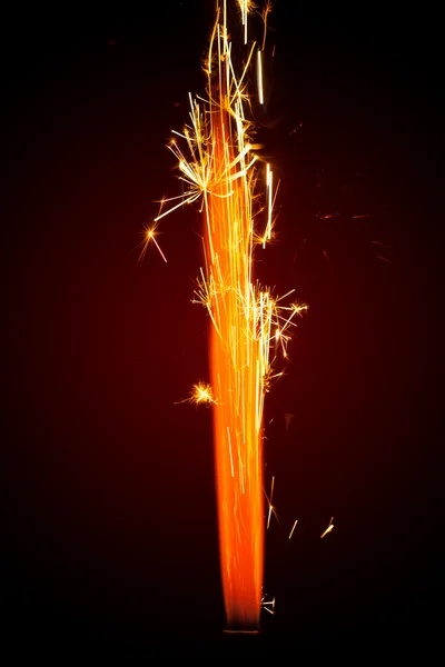 Faísca fogo de artifício com brilho vermelho — Fotografia de Stock