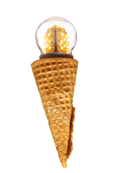 Led lamp in ice cream cone, innovation concept — Stock Photo, Image