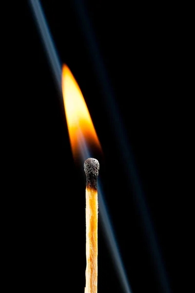 Burning match with smoke trail on the background — Stock Photo, Image