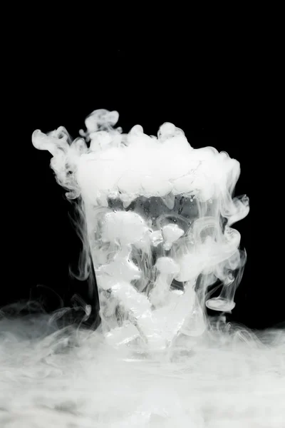 Glass of water with ice vapor — Stock Photo, Image
