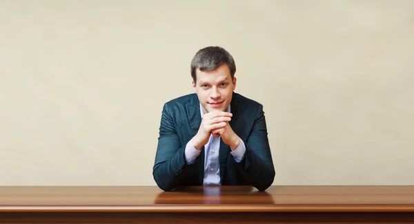 Business man on a desk — Stock Photo, Image