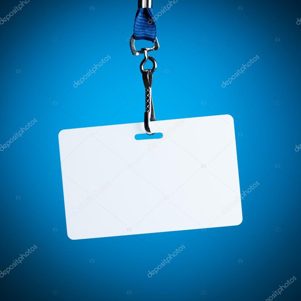 empty white badge backdrop against blue background