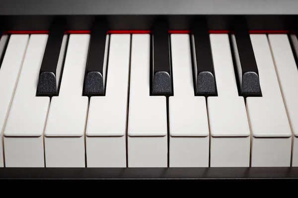 Grand piano ebony and ivory keys — Stock Photo, Image