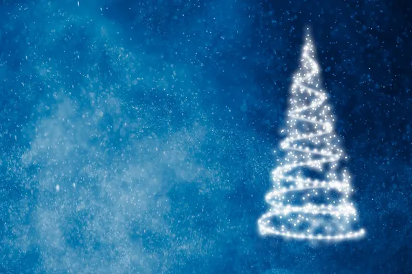 抽象圣诞树上闪闪发亮的蓝色背景 — 图库照片