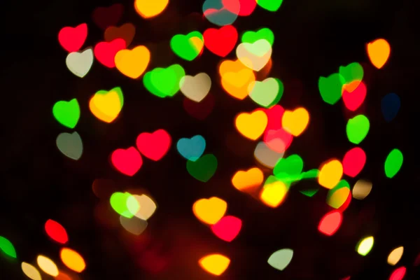 Abstract festive hearts bokeh — Stock Photo, Image