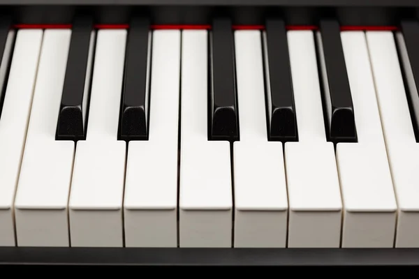 Grand piano ebony and ivory keys — Stock Photo, Image